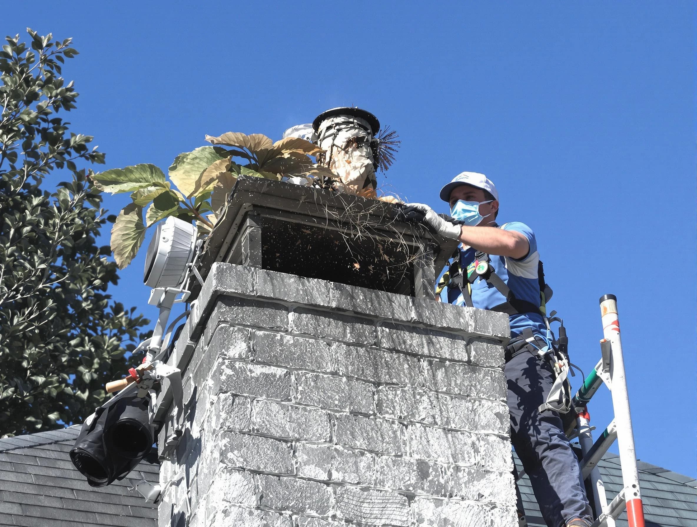 Somerset Chimney Sweep specialist performing chimney cleaning in Somerset, NJ